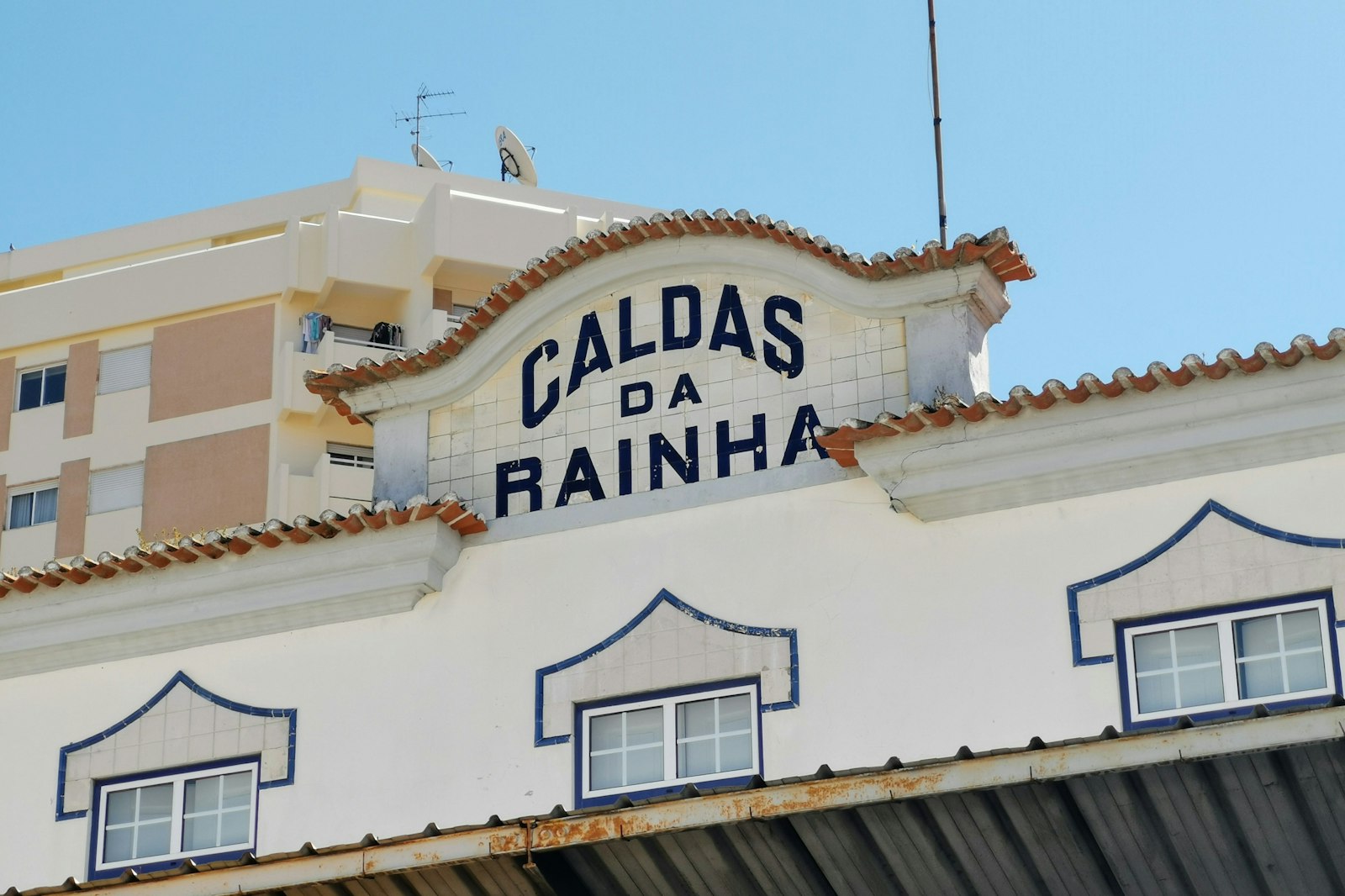 A building facade with the Caldas da Rainha sign, Portugal