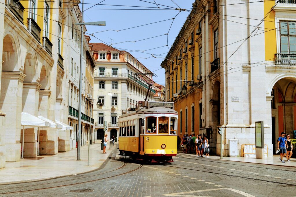 Lisbon tram on a historic street — Portuguese bureaucracy and NIF process